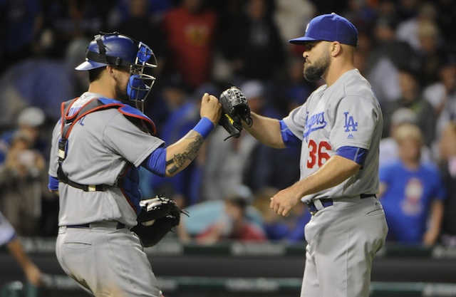 Yasmani-grandal-adam-liberatore