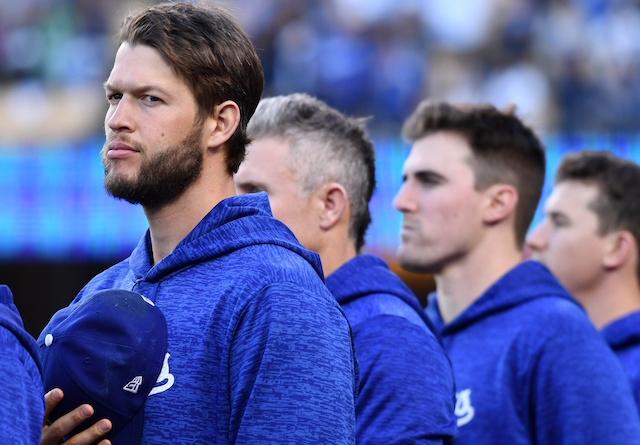 Los Angeles Dodgers pitchers Walker Buehler, Clayton Kershaw and Ross Stripling lined up for the national anthem at Dodger Stadium