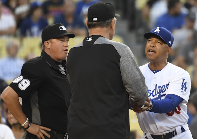 San Francisco Giants manager Bruce Bochy and Los Angeles Dodgers manager Dave Roberts before a game at Dodger Stadium