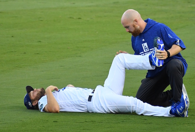 Clayton Kershaw stretching, Brandon McDaniel, 2018 NLDS