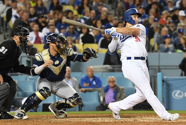 Los Angeles Dodgers outfielder Joc Pederson hits a home run against the Milwaukee Brewers