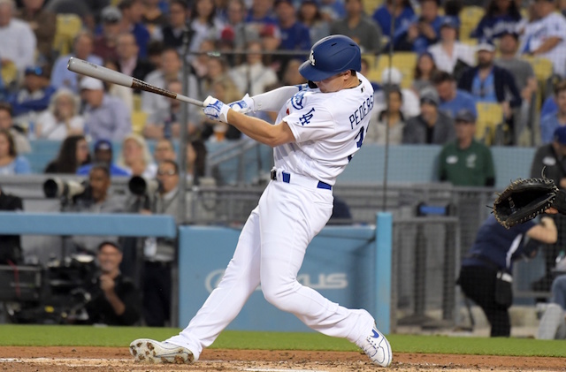 Los Angeles Dodgers left fielder Joc Pederson hits a home run