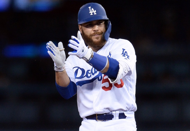 Los Angeles Dodgers catcher Russell Martin reacts after hitting a double