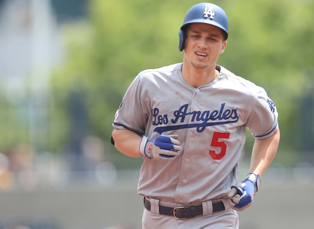 Los Angeles Dodgers shortstop Corey Seager rounds the bases after hitting a home run against the Pirates