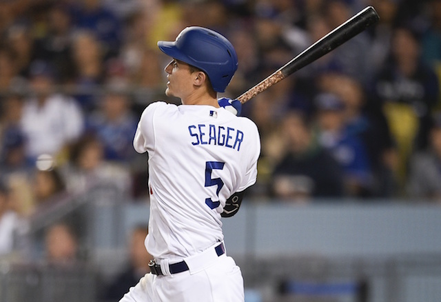 Los Angeles Dodgers shortstop Corey Seager hits a home run off Philadelphia Phillies starting pitcher Jake Arrieta