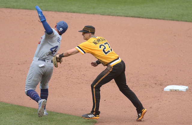 Los Angeles Dodgers infielder Matt Beaty attempts to avoid a tag during a game against the Pittsburgh Pirates