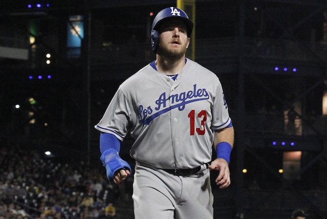 Los Angeles Dodgers infielder Max Muncy scores during a game against the Pittsburgh Pirates