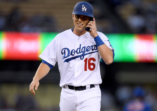 Los Angeles Dodgers catcher Will Smith walks back to the dugout at Dodger Stadium