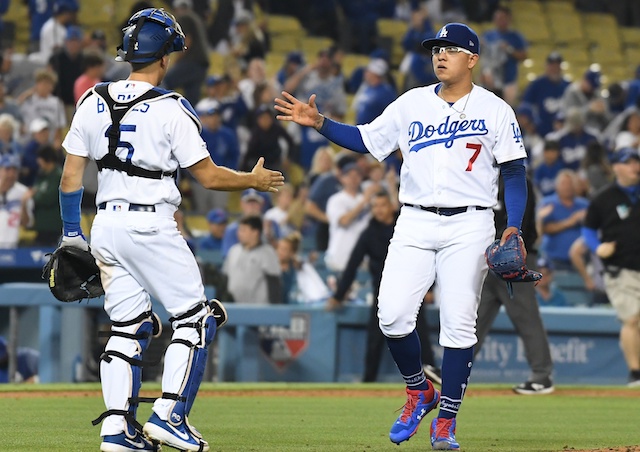 Austin Barnes and Julio Urias celebrate after the Los Angeles Dodgers defeat the Chicago Cubs