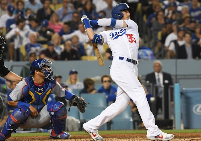 Los Angeles Dodgers right fielder Cody Bellinger hits a home run off Chicago Cubs starting pitcher Jon Lester