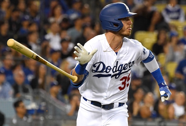 Los Angeles Dodgers right fielder Cody Bellinger hits a home run against the Colorado Rockies