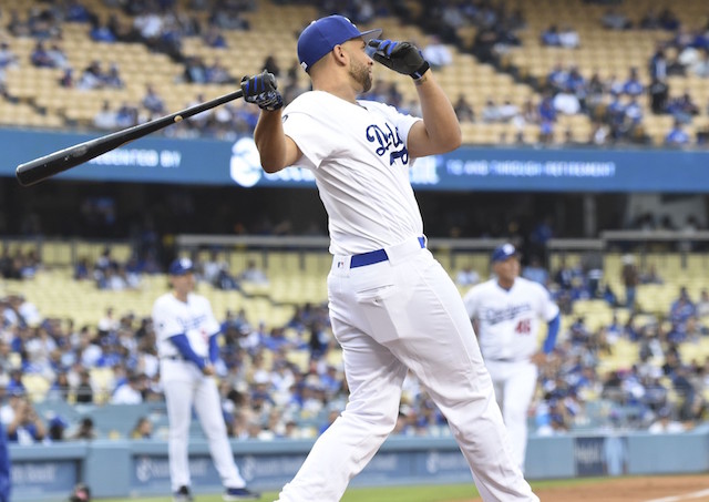 Former Los Angeles Dodgers first baseman James Loney hits a grand slam during the 2019 Alumni Game at Dodger Stadium