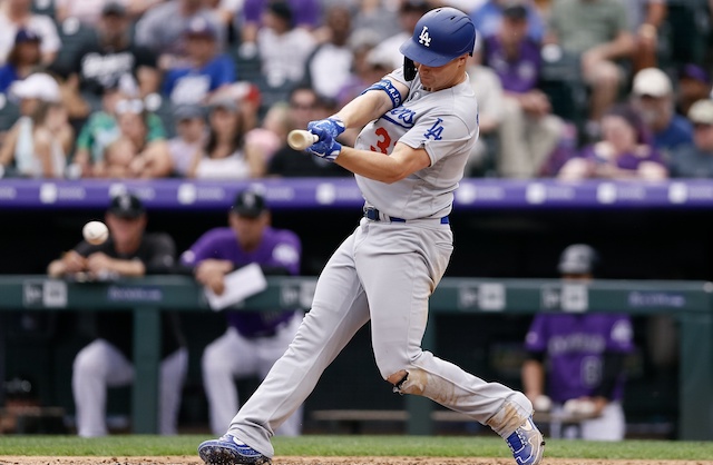 Los Angeles Dodgers outfielder Joc Pederson hits a two-run single against the Colorado Rockies