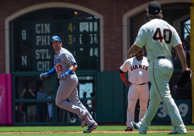 San Francisco Giants starting pitcher Madison Bumgarner yells at Los Angeles Dodgers infielder Max Muncy after allowing a home run