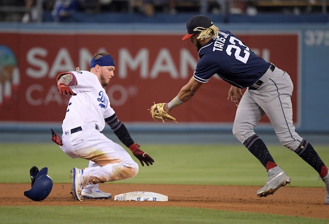 Los Angeles Dodgers outfielder Alex Verdugo slides into second base