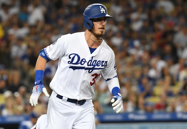 Los Angeles Dodgers right fielder Cody Bellinger hits a single against the Los Angeles Angels of Anaheim