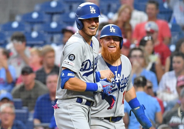 Los Angeles Dodgers teammates Cody Bellinger and Justin Turner celebrate after a home run at Citizens Bank Park