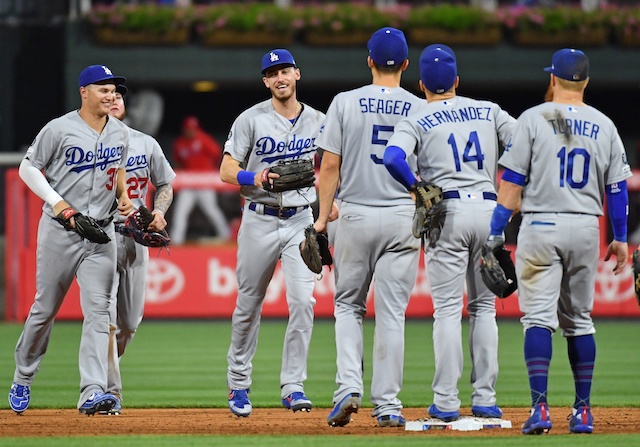 Cody Bellinger, Kiké Hernandez, Joc Pederson, Corey Seager, Justin Turner and Alex Verdugo celebrate after a Los Angeles Dodgers win at Citizens Bank Park