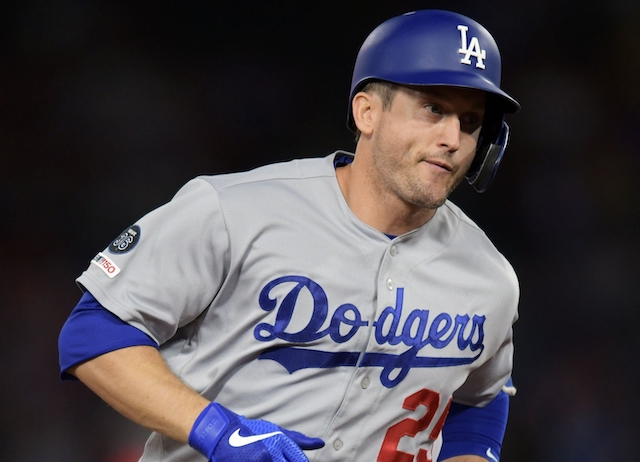 Los Angeles Dodgers first baseman David Freese rounds the bases after hitting a home run