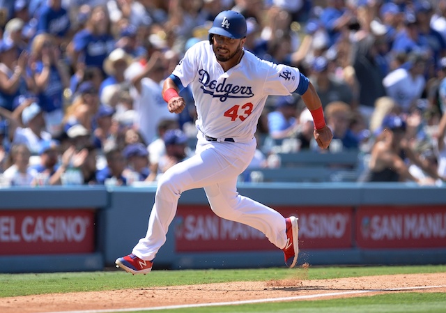 Los Angeles Dodgers infielder Edwin Rios runs toward home plate at Dodger Stadium