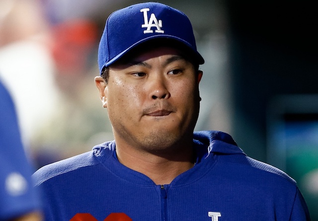 Los Angeles Dodgers starting pitcher Hyun-Jin Ryu in the dugout at Coors Field