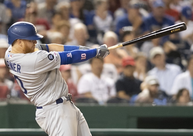 Los Angeles Dodgers third baseman Justin Turner hits a home run against the Washington Nationals