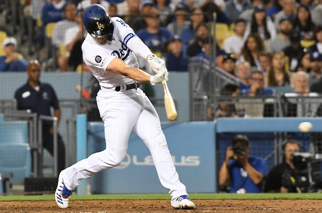 Los Angeles Dodgers second baseman Kiké Hernandez hits a ground ball