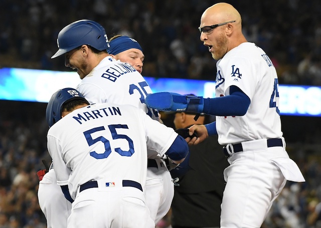 Matt Beaty, Cody Bellinger, Russell Martin and Alex Verdugo after a Los Angeles Dodgers walk-off win against the Arizona Diamondbacks