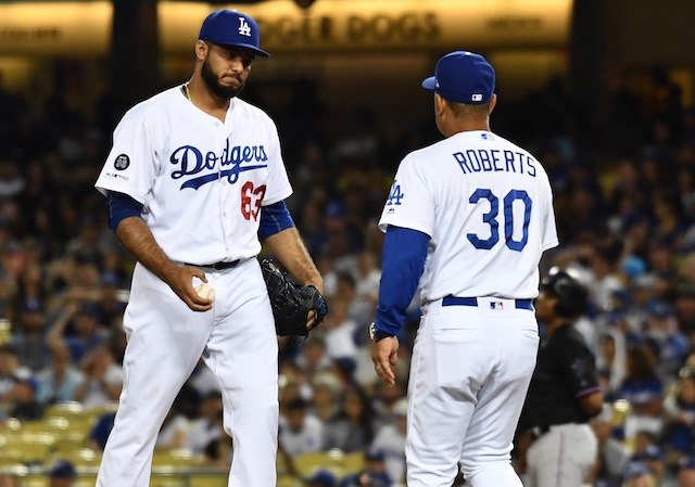 Los Angeles Dodgers manager Dave Roberts removes Yimi Garcia during a pitching change