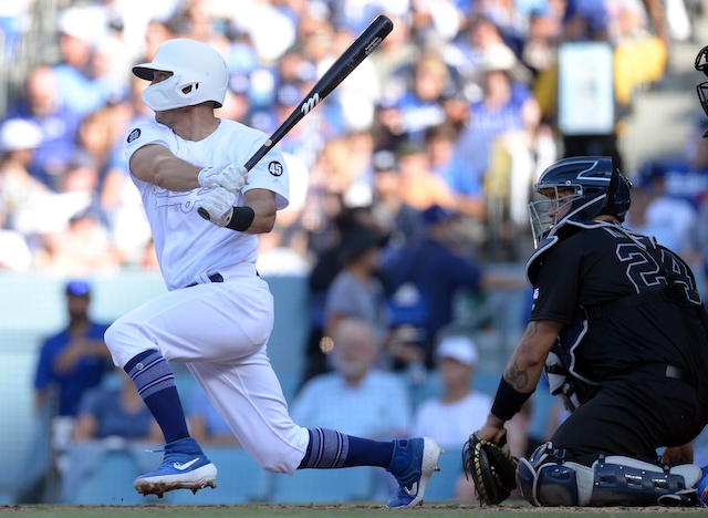 Los Angeles Dodgers catcher Austin Barnes hits a double against the New York Yankees