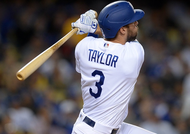 Los Angeles Dodgers utility player Chris Taylor hits a home run against the Toronto Blue Jays