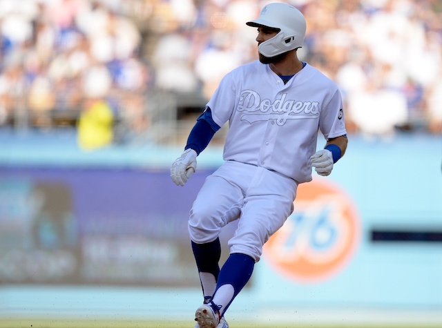 Los Angeles Dodgers utility player Chris Taylor hits a double against the New York Yankees