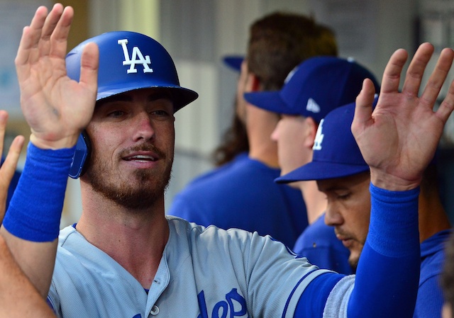 Los Angeles Dodgers All-Star Cody Bellinger is congratulated after scoring a run