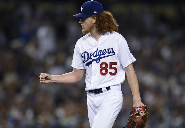 Los Angeles Dodgers pitcher Dustin May reacts during his MLB debut