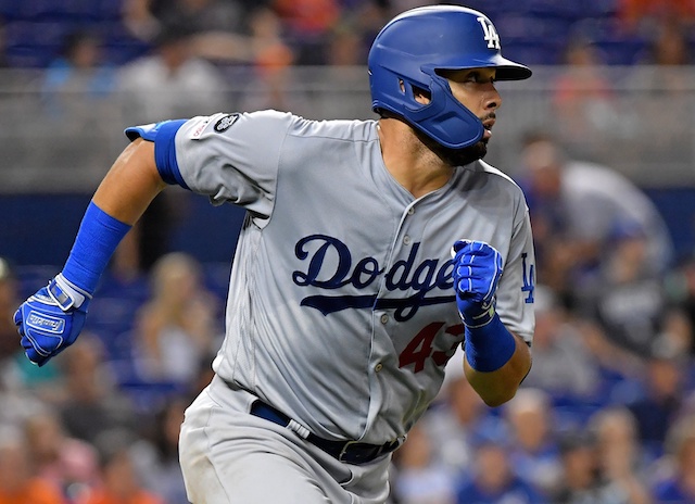 Los Angeles Dodgers infielder Edwin Rios hits a home run