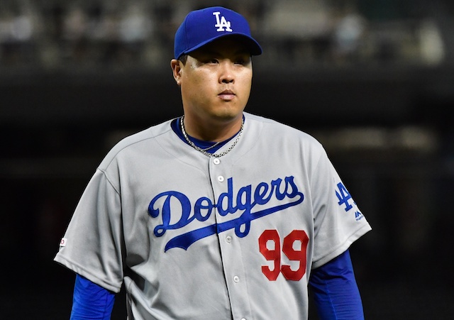 Los Angeles Dodgers pitcher Hyun-Jin Ryu walks off the field between innings