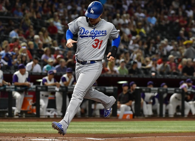 Los Angeles Dodgers outfielder Joc Pederson scores a run against the Arizona Diamondbacks