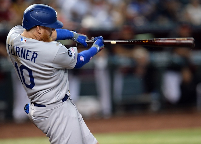 Los Angeles Dodgers third baseman Justin Turner hits a home run