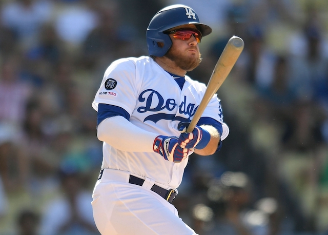 Los Angeles Dodgers infielder Max Muncy hits a home run against the San Diego Padres