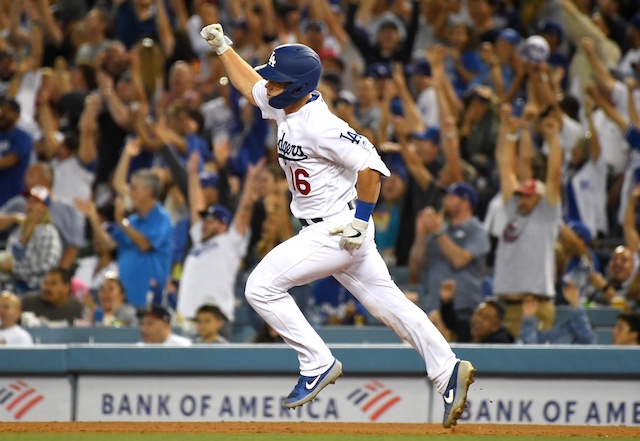 Los Angeles Dodgers catcher Will Smith reacts after hitting a grand slam against the San Diego Padres