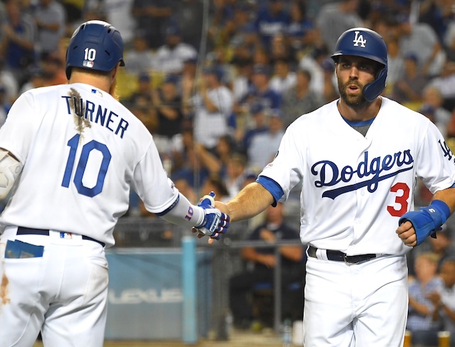 Los Angeles Dodgers teammates Chris Taylor and Justin Turner celebrate