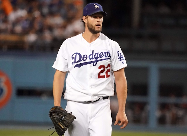 Los Angeles Dodgers pitcher Clayton Kershaw walks off the field between innings of a start against the San Francisco Giants