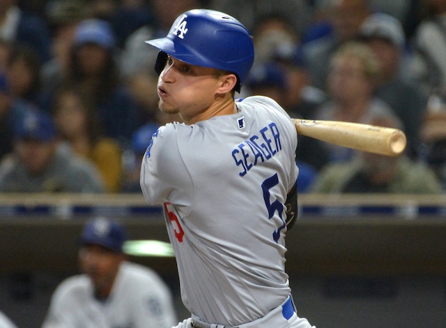 Los Angeles Dodgers shortstop Corey Seager hits an RBI double against the San Diego Padres