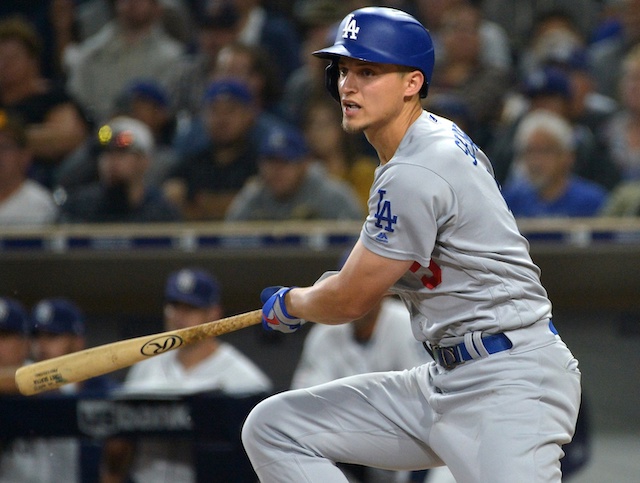 Los Angeles Dodgers shortstop Corey Seager hits an RBI double against the San Diego Padres