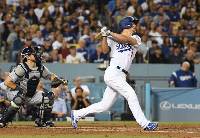 Los Angeles Dodgers shortstop Corey Seager hits a double against the Tampa Bay Rays