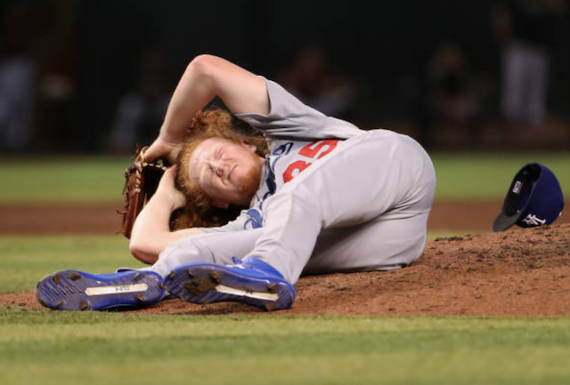 Los Angeles Dodgers pitcher Dustin May hit in the head by a line drive