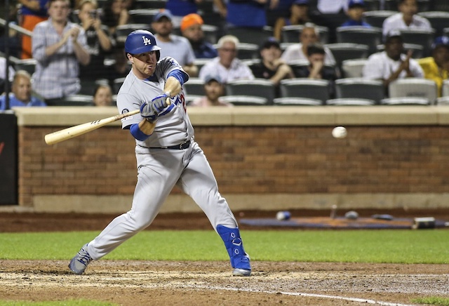 Los Angeles Dodgers infielder Jedd Gyorko hits an rBI single against the New York Mets