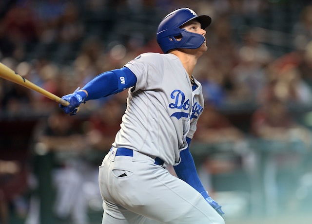 Los Angeles Dodgers outfielder Joc Pederson watches a home run