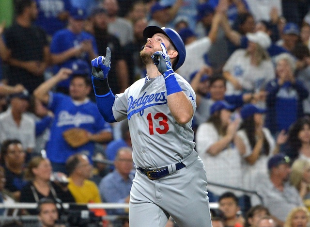 Los Angeles Dodgers infielder Max Muncy celebrates after hitting a grand slam against the San Diego Padres