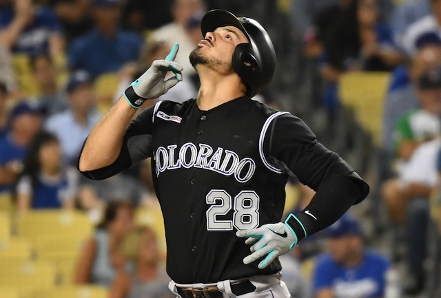 Colorado Rockies third baseman Nolan Arenado celebrates after hitting a home run against the Los Angeles Dodgers